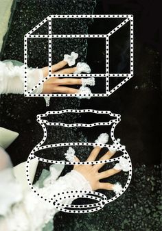 two hands are touching each other in front of a black and white photo with squares