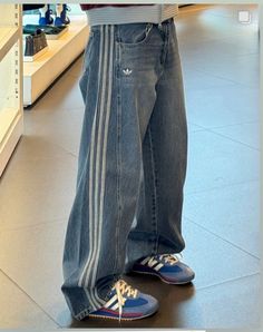 Adidas Winter Streetwear Bottoms, Denim Trousers For Streetwear, Adidas Wide Leg Jeans, Baggy Denim Pants For Streetwear, Blue Grunge Streetwear Pants, Baggy Adidas Pants, Baggy Jeans With Stripes On The Side, Vintage Denim Pants For Streetwear, Adidas Denim Jeans
