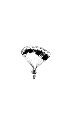 a black and white photo of a person parachuting in the sky with one parachute