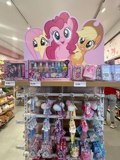 there are many toys on display in the store