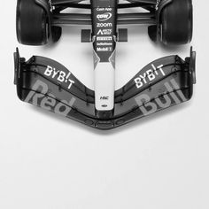 the front and rear wheels of a racing car
