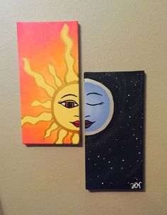 two paintings hang on the wall next to each other, one has a sun and moon painted on it