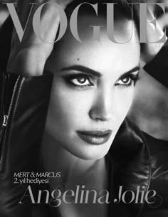 a magazine cover with an image of a woman in black leather jacket on the cover