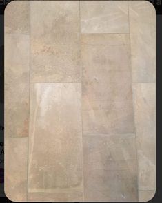 an image of a tile floor that looks like it is made out of stone or marble