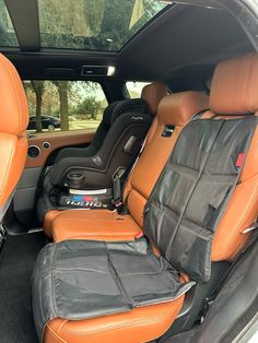 the interior of a car with leather seats
