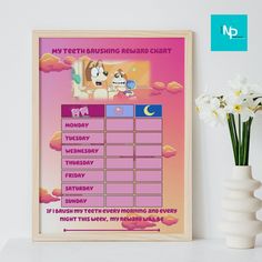 there is a poster on the wall next to a vase with white flowers in it