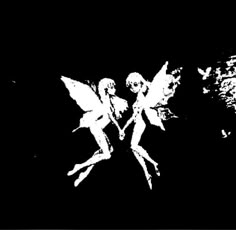 two white cherubs on a black background