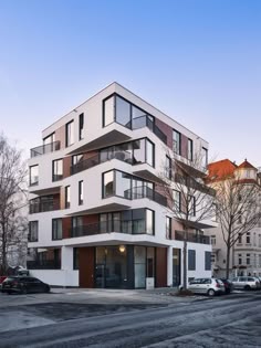 an apartment building with many balconies and windows