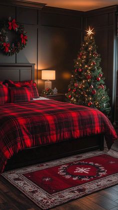 a bedroom decorated for christmas with a red and black plaid comforter