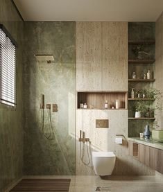 a modern bathroom with green marble walls and wood flooring, including a large shower