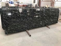 a black marble counter top in a warehouse