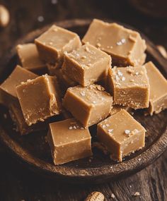 pieces of peanut butter fudge on a wooden plate