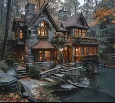 this is an image of a beautiful house in the woods with stone and wood accents