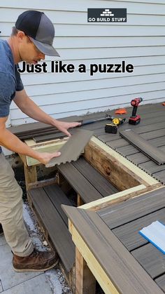 a man is working on an outdoor table