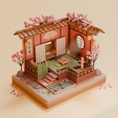 a paper model of a japanese house with pink flowers on the roof and trees around it