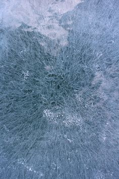 an aerial view of snow and ice on the ground