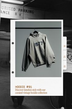 a black and white photo of a jacket hanging on a clothes line with the words hoodie 1011 above it