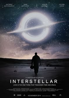 a movie poster for intersteular with a man walking in front of an object
