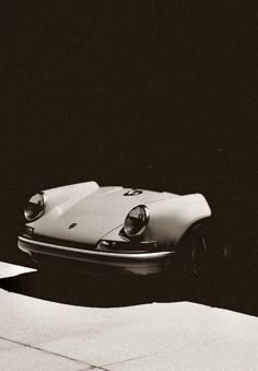 a black and white photo of a car