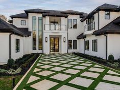 a large white house with lots of windows