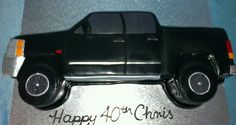 a birthday cake shaped like a car with the number forty four on it