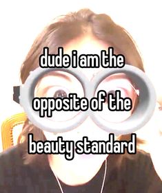 a woman looking through two magnifying glasses with the words dude i am the opposite of