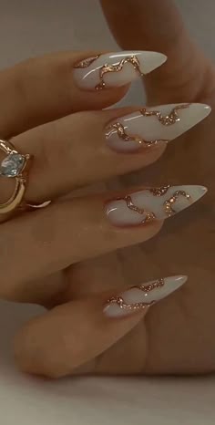 27 Winter Gold Nail Designs That Are Wonderfully Chic & Fab! Long Round Acrylic Nails, Classy White And Gold Nails, White And Gold Nails Prom, White Gold Prom Nails, Prom Nails Gold And White, White Nails With Gold Outline, White And Gold Birthday Nails, Elegant White And Gold Nails, White And Gold Nail Designs Almond