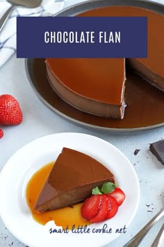 chocolate flan on a plate with strawberries next to it and the words, chocolate flan