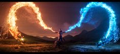 two people on motorcycles with fire in the air and mountains behind them, one person is holding