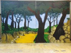 the painting on the wall is done with acrylic paint and it looks like trees