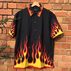Bold Flame Design Shirt, Black And Red Flame Pattern, Flame Print Shirt On Brick Wall, Rockabilly Fashion Ideas, Unique Party Outfit Inspiration, Flames Tshirt, Flame Shirt Outfit, Diy Flame Shirt, Flame Shirt Outfit Men