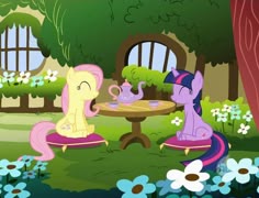 two ponies sitting at a table in the middle of a flowery garden with flowers around