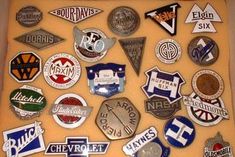 a box filled with lots of different types of badges