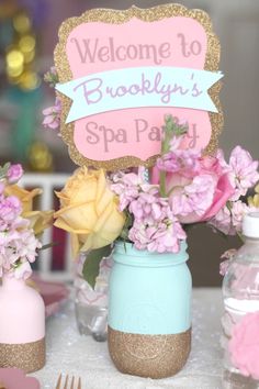 there is a sign that says welcome to brooklyn's spa party on the table