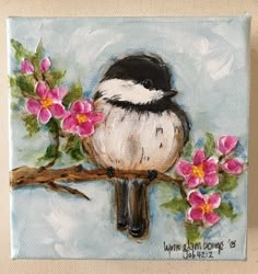 a painting of a bird perched on a branch with pink flowers