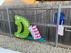 there is a fence that has some items on it