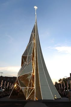a very tall white building with a star on it's top