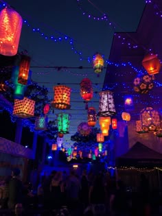 many lanterns are lit up in the night sky