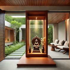 a buddha statue sitting in the middle of a room