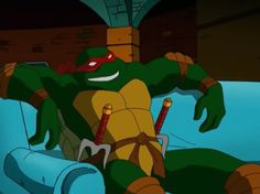 the teenaged ninja turtle is sitting on an inflatable tube