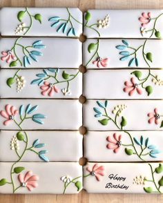 decorated cookies are arranged in the shape of flowers