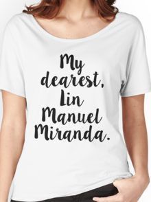 a woman wearing a white t - shirt that says my dearest, i'm manuel miranda