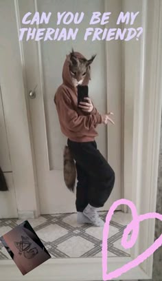 a cat in a hoodie looking at a cell phone with the caption can you be my siberian friend?