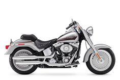 a silver and black motorcycle on a white background