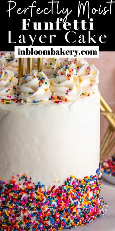 a white cake with sprinkles on it and the words perfectly moist layer cake