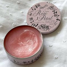 Coquette Products, Coquette Beauty Products, Vintage Makeup And Skincare Products, Coquette Lip Balm, Rose Co Vanilla Salve, Pink Vintage Makeup Accessory, Vintage Floral Perfume Tin, Vintage Floral Rose Tea Tin, Rose Scented Balm