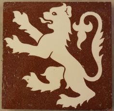 a red and white sign with a lion on it's back side that says pilsner