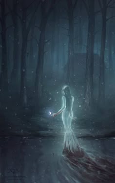 a woman standing in the middle of a dark forest holding a light up to her face