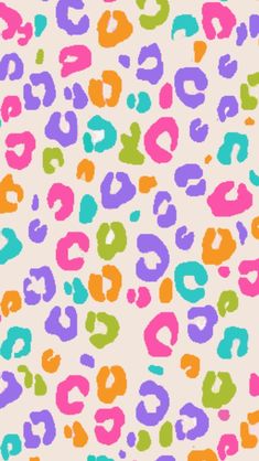 an animal print pattern with multicolored spots on a white background that is very similar to the colors of the rainbow