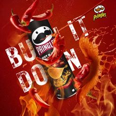 a can of pringle hot sauce surrounded by fire and chili peppers on a red background